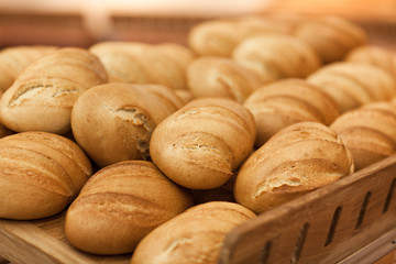 Fresh wheat bread on shelf in supermarket