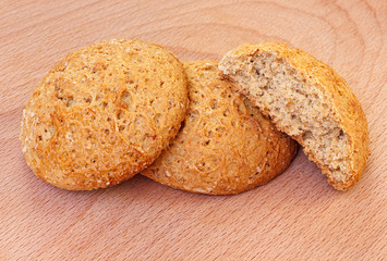 Natural oat cookies portion on wooden background