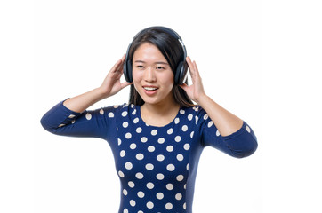 Smiling young Chinese woman with Earphones