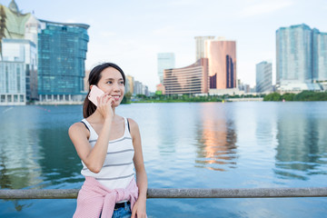Young Woman taking to mobile phone