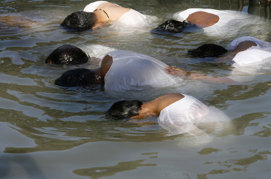 Christian pilgrims in Jordan River, Yardenit, Israel