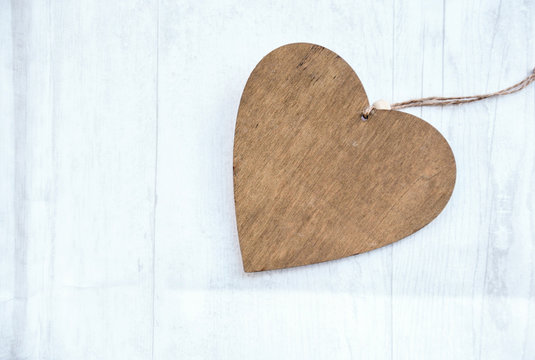 wooden heart on white background 