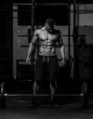 Man about to lift Barbell