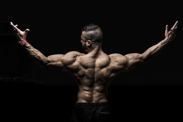 Man showing muscular Back