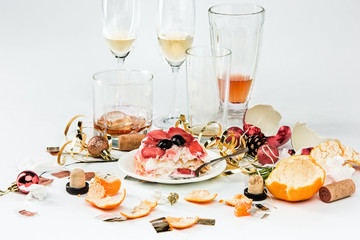 The morning after christmas day, table with alcohol and leftovers