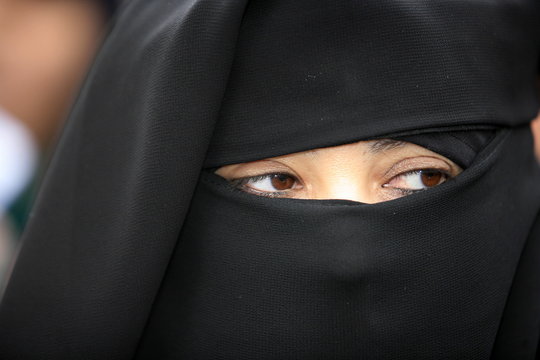Veiled woman, Paris, France