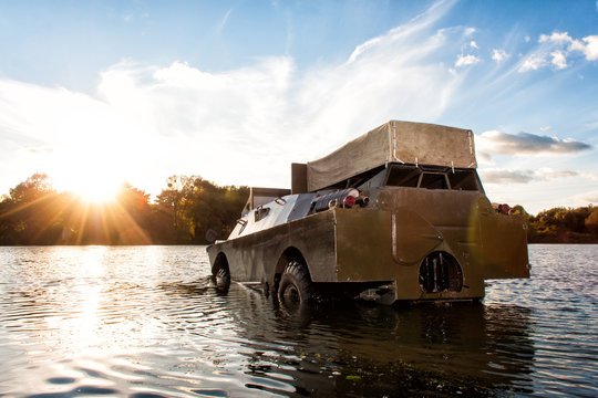 BRDM, armoured reconnaissance and patrol vehicle in the river,military machine