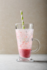 Pink smoothie in glass