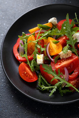 Tasty tomato salad on plate