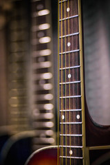 Close view of guitar fretboard