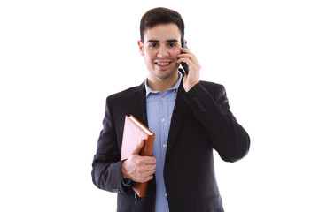 Young man with mobile phone and book isolated on white