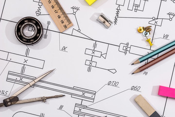Workplace - technical project drawing with engineering tools. Construction background.