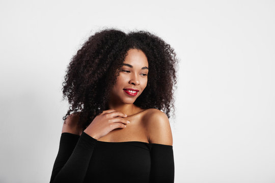 studio shoot of black woman with big afro hair