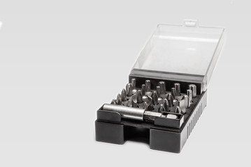 Set of screw tips in a black plastic box