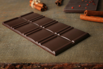 Chocolate bar on wooden background