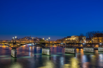 Fototapeta na wymiar Pont des arts Bridge by the Seine river iin Paris at night