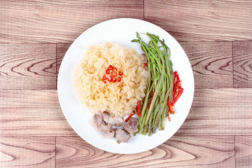 Thai spicy fried snow fungus mushroom with morning glory.