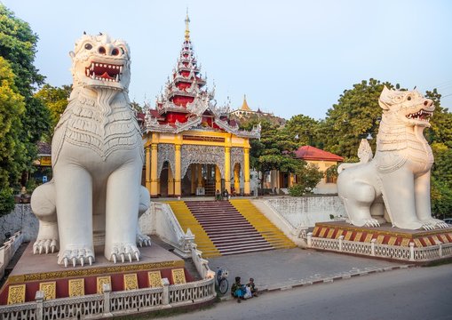 Mandalay, Myanmar-12 December, 2015. Southern stairway with its magnificent guardian chinthe at the entry to Mandalay hill pagodas on 12 December, 2015 in Mandalay.