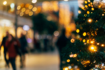 christmas time and tree in a blurred visual, in a commercial centre, Berlin