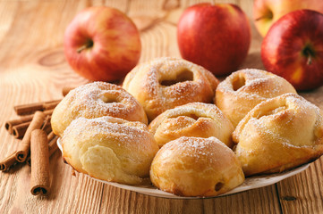 Homemade sweet yeast buns with apple filling.