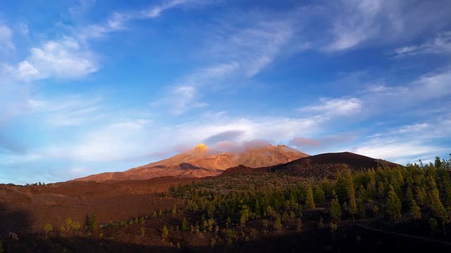 Time lapse video of famous Teide Mountain, Tenerife, Canary Islands. Beautiful sunset over high mountain. Pico de Teide is the highest mountain in Canary Islands - 3,718-metre (12,198 ft).