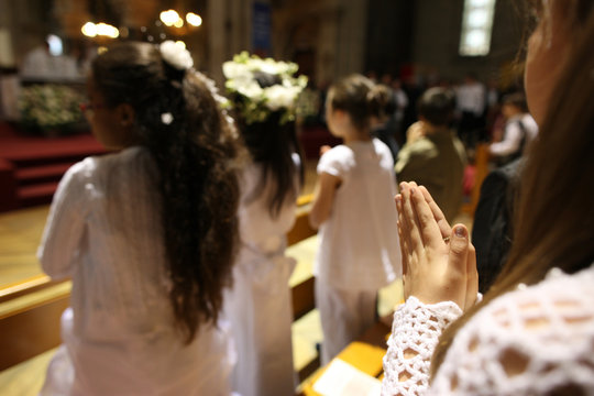 First Communion celebration in a Catholic church, Paris, France
