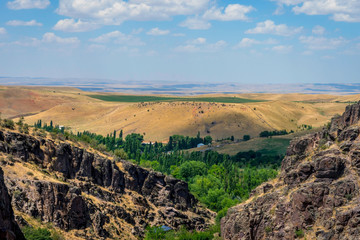 Turbat canyon and grasslands behind, Kazakhstan