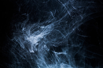 Acrylic colors and ink in water. Abstract background