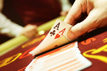 Poker cards ace hand success casino concept