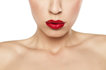 Obraz na płótnie Canvas red lipstick, sexy lips and bare shoulders