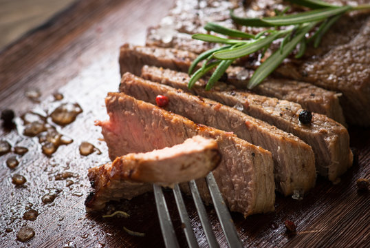 Grilled beef steak sliced.