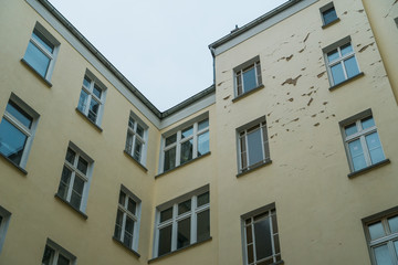 yellow facaded house from the courtyard