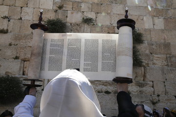 A ceremonial reading of the Torah from Torah scroll under the Western Wall, Jerusalem, Israel 