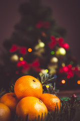Close-up tangerines on homely festive atmosphere 
