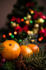 Close-up tangerines on homely festive atmosphere 