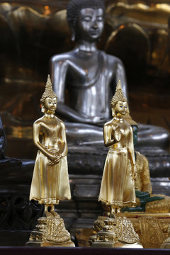 Buddha statues, main altar, Wat Velouvanaram, Bussy Saint Georges, Seine et Marne, France
