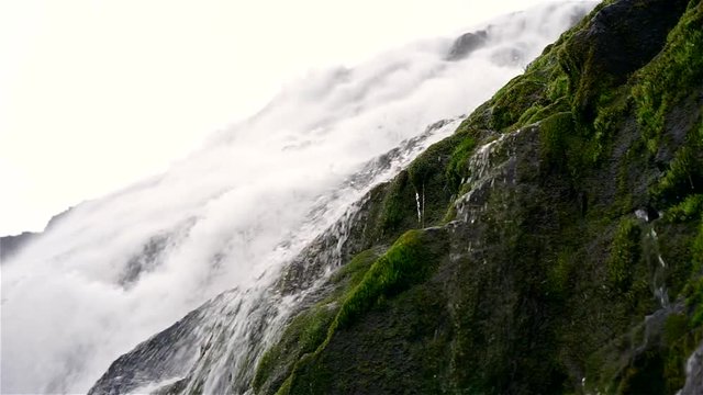 Detail view of Dynjandi Waterfall, Westfjord, Iceland. Footage of a huge Dynjandi waterfall running in cascades from a mountain.