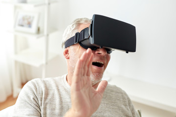old man in virtual reality headset or 3d glasses