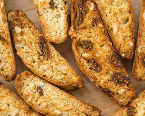 Classic Italian biscotti cookies on a wooden background. Baked crispy biscuits.