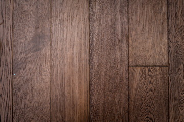 Texture of fine dark brown parquet