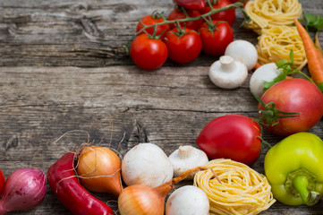 Vegetable set on a wooden background. Top view. Close-up