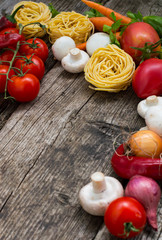 Vegetable set on a wooden background. Top view. Close-up
