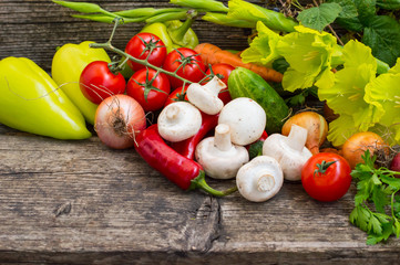 Vegetable set on a wooden background. Close-up