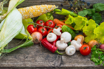 Vegetable set on a wooden background. Close-up