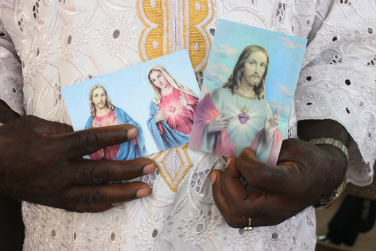 Religious images of Christ and Mary, Lome, Togo, West Africa