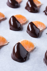 mandarin, tangerine fruits covered chocolate