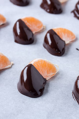 mandarin, tangerine fruits covered chocolate