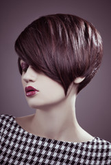 Beautiful woman portrait with fashion haircut and creative trendy make-up