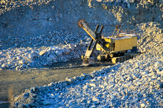 Heavy machinery in the granite quarry