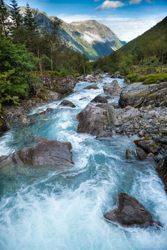 Milky blue glacier river in Norway